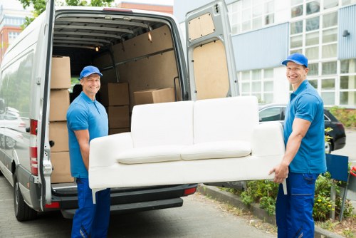 Removal van and moving team preparing a house move in Twickenham