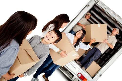 Professional packing team helping a Twickenham household prepare boxes for moving day
