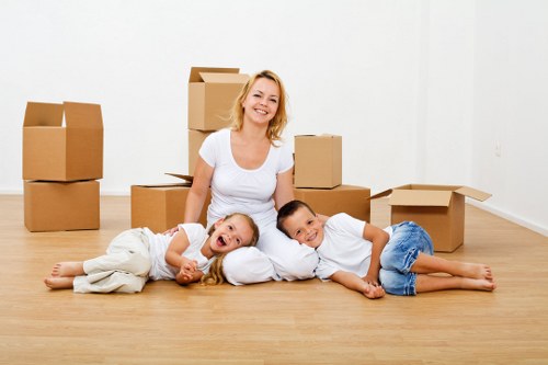 Local movers loading furniture on a Twickenham street