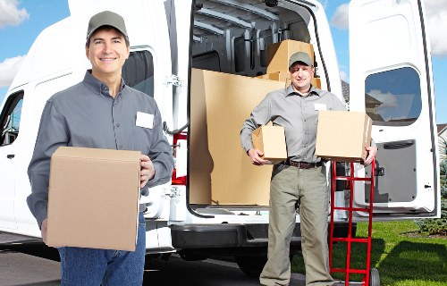 Local movers working in a Twickenham residential street